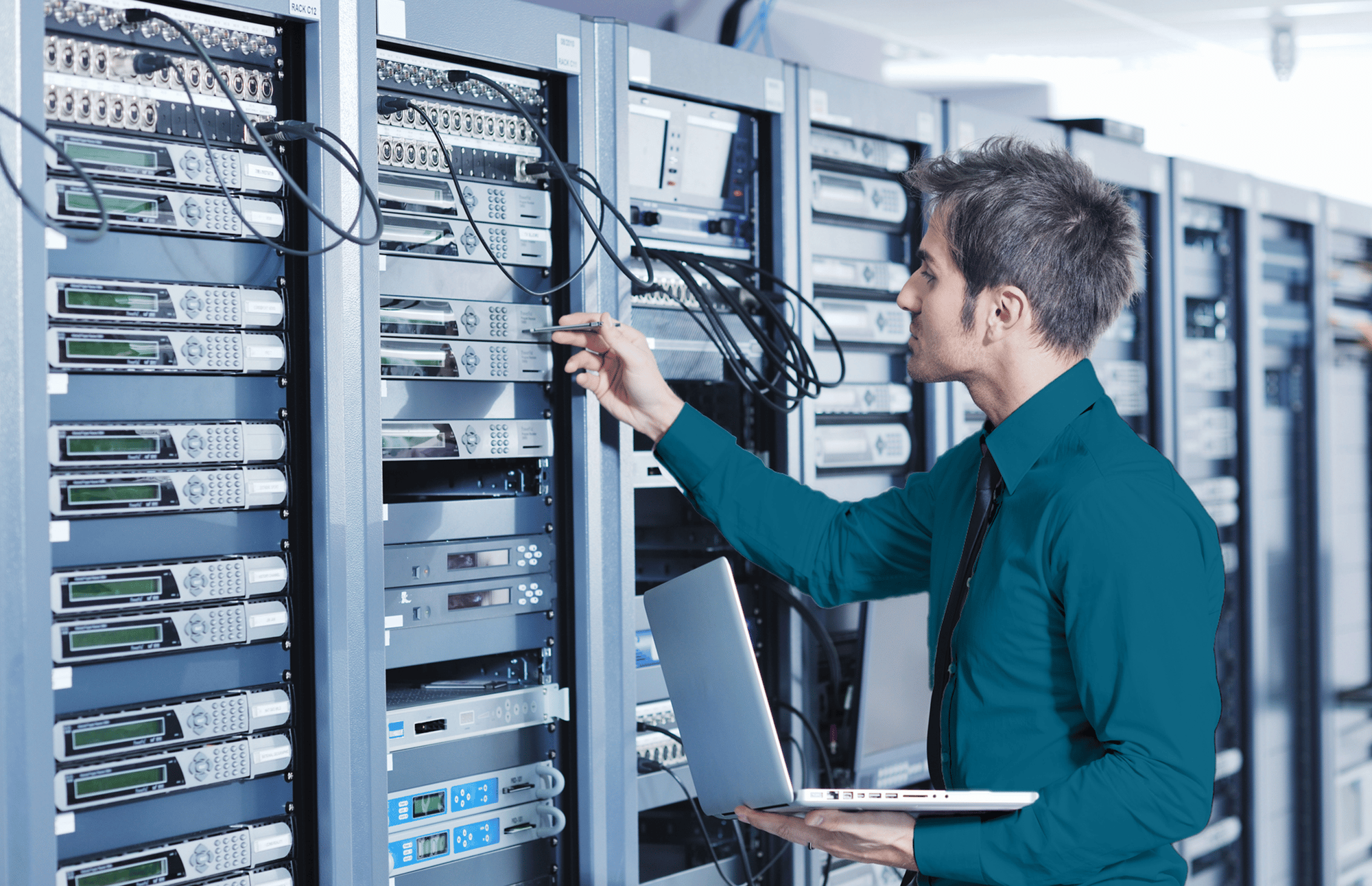SSI man in server room blue short@1.25x-1